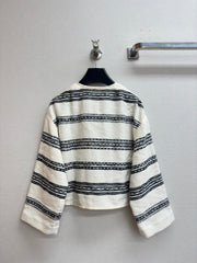 Round neck black and white striped single-row metal button pattern jacket