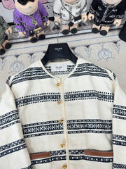 Round neck black and white striped single-row metal button pattern jacket